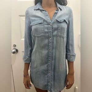 Light blue denim dress with silver buttons. Lightly used, no flaws.